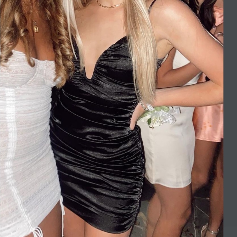 Women’s ruched black mini dress